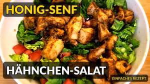 Warmer Honig-Senf-Hähnchen-Salat mit Feldsalat und Erdnüssen